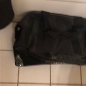 Blk duffel with patent leather